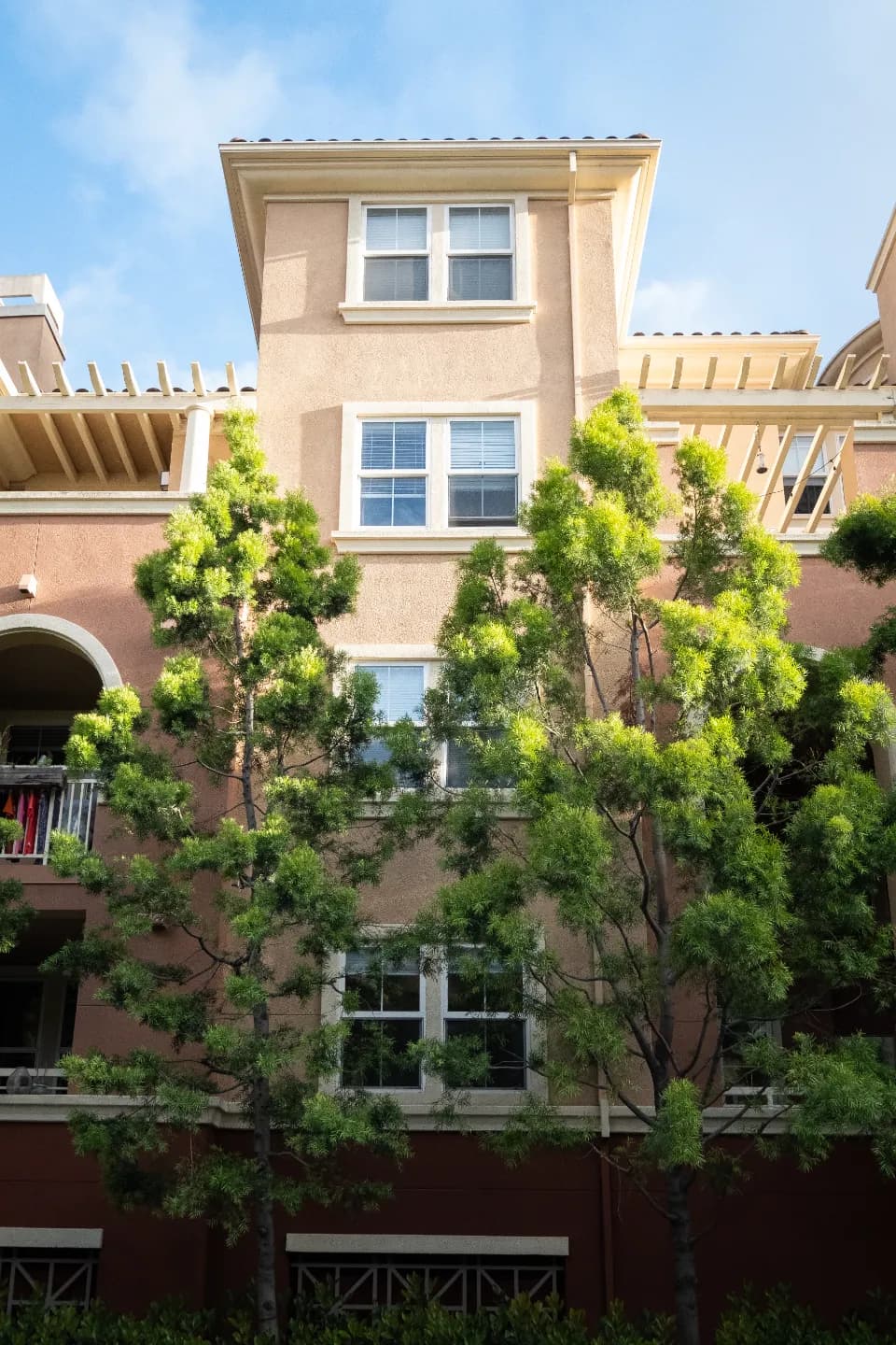 Apartment building with landscaped trees