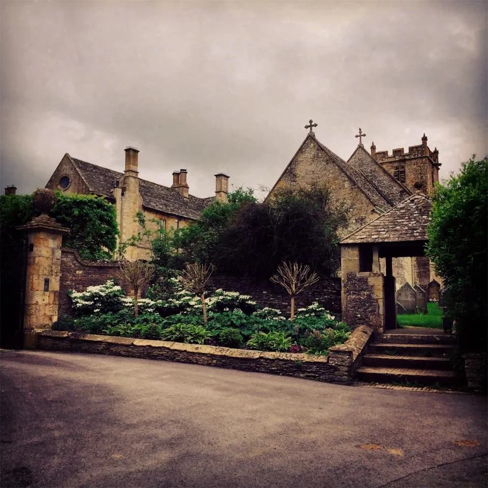 Stone church buildings with a courtyard and walkway