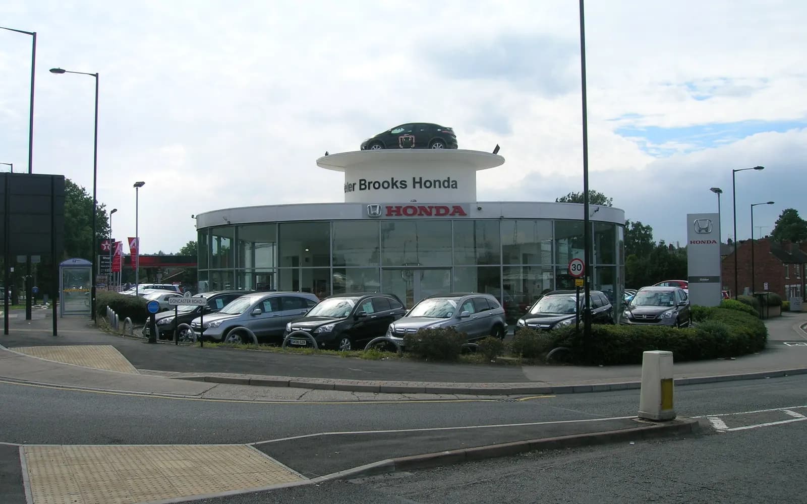Dealership showroom and rooftop location exterior