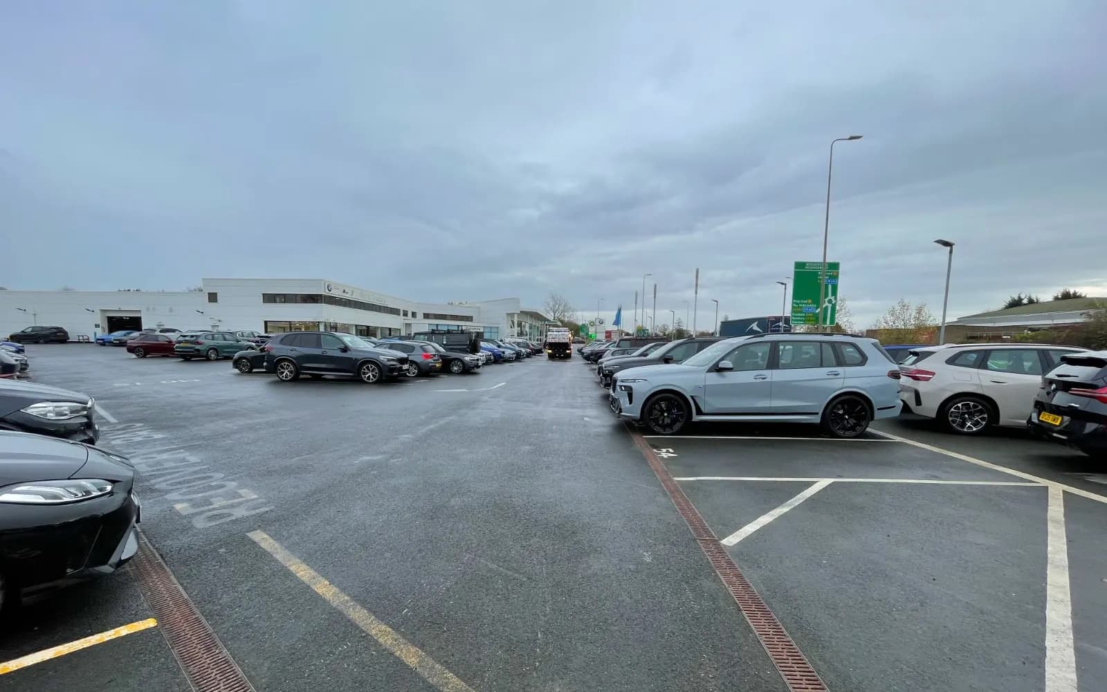 Outdoor dealership inventory lot filled with vehicles