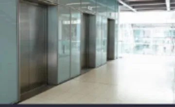 Building lobby camera view with elevator doors
